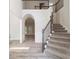Welcoming foyer with staircase and arched doorway at 120 Julia Ct, Fayetteville, GA 30214