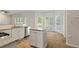 Open kitchen featuring granite counters, stainless appliances and a central island at 120 Julia Ct, Fayetteville, GA 30214