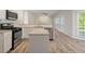 Bright kitchen featuring stainless steel appliances, granite counters and white cabinets at 120 Julia Ct, Fayetteville, GA 30214