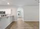 Bright kitchen area showcasing bar seating and light-filled entryway at 120 Julia Ct, Fayetteville, GA 30214