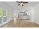 Inviting living area with a doorway to a kitchen space with a breakfast bar at 120 Julia Ct, Fayetteville, GA 30214