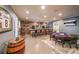 Finished basement with custom bar, poker table, and sports memorabilia for entertaining at 2439 Huntington Park Nw Dr, Acworth, GA 30101
