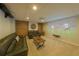 Finished basement with a large projection screen and comfortable seating, perfect for entertainment at 2439 Huntington Park Nw Dr, Acworth, GA 30101
