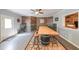 A finished basement featuring a long wooden table with stools and a popcorn machine at 2439 Huntington Park Nw Dr, Acworth, GA 30101