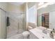Bathroom featuring a glass door shower with patterned tile and a vanity sink at 2439 Huntington Park Nw Dr, Acworth, GA 30101