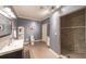Modern bathroom with stylish vanity, neutral paint, and a luxurious walk-in shower at 2439 Huntington Park Nw Dr, Acworth, GA 30101