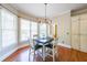 Cozy dining area with a window view and a four-chair dining table at 2439 Huntington Park Nw Dr, Acworth, GA 30101