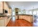 Spacious kitchen with stainless steel appliances, granite countertops, and hardwood flooring at 2439 Huntington Park Nw Dr, Acworth, GA 30101