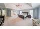 Large main bedroom with lots of space and natural light from several windows at 2439 Huntington Park Nw Dr, Acworth, GA 30101