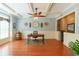 Stylish home office with custom built-ins, coffered ceilings, and a window providing natural light at 2439 Huntington Park Nw Dr, Acworth, GA 30101