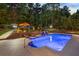 Inviting pool area features a sundeck, lounge chairs, and a charming pergola for entertaining at 2439 Huntington Park Nw Dr, Acworth, GA 30101