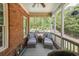 Relaxing screened porch with comfortable seating, providing a peaceful outdoor living space at 2439 Huntington Park Nw Dr, Acworth, GA 30101