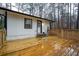 Spacious wooden deck with railing, accessible from the home, perfect for outdoor entertaining at 5101 Rockbridge Rd, Stone Mountain, GA 30088