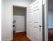 A utility room shows the water heater behind an open five panel door at 5101 Rockbridge Rd, Stone Mountain, GA 30088