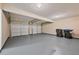 Spacious two-car garage with ample room for parking and storage at 5135 Gable Ridge Way, Sugar Hill, GA 30518