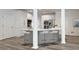 Bright kitchen featuring a center island with seating, stainless steel appliances, and ample white cabinetry at 515 Old Chartwell Xing, Alpharetta, GA 30022