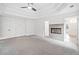 Spacious main bedroom with tray ceiling, fireplace, and entry to the main bath at 515 Old Chartwell Xing, Alpharetta, GA 30022