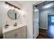 Bathroom featuring a vanity, modern lighting and a doorway at 1399 Pollard Sw Dr, Atlanta, GA 30311