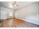 Bedroom featuring vinyl floors, ceiling fan, and a door at 1399 Pollard Sw Dr, Atlanta, GA 30311