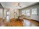 Bright dining room featuring natural light and gleaming hardwood floors at 1399 Pollard Sw Dr, Atlanta, GA 30311