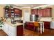 Spacious kitchen with stainless steel appliances, granite countertops, and custom cabinets at 4215 Idlewood Dr, Cumming, GA 30040