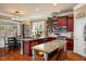 Stylish kitchen with granite counters, stainless appliances and eat-in island at 4215 Idlewood Dr, Cumming, GA 30040