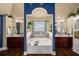 Elegant main bathroom features a large soaking tub, dual vanities, and modern fixtures at 4215 Idlewood Dr, Cumming, GA 30040