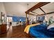 Spacious main bedroom features a canopy bed, office area, and access to an ensuite bathroom and walk-in closets at 4215 Idlewood Dr, Cumming, GA 30040