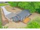 Bird's eye view shows house's layout, deck, and adjacent covered carport at 4901 Prince Se Rd, Smyrna, GA 30082