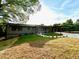Charming single story home with convenient covered carport, and green lawn at 4901 Prince Se Rd, Smyrna, GA 30082