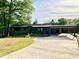Charming single story home with convenient covered carport and extended driveway at 4901 Prince Se Rd, Smyrna, GA 30082