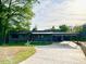 Charming single story home with convenient covered carport and large driveway at 4901 Prince Se Rd, Smyrna, GA 30082