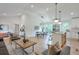 Bright and airy living space with hardwood floors flowing into the open kitchen at 4901 Prince Se Rd, Smyrna, GA 30082