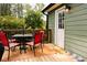 Back porch with outdoor seating and dining area perfect for relaxing or entertaining guests at 114 Summer Glen Pl, Dallas, GA 30157