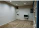 Unfinished basement space with carpet, recessed lighting, and wall heater at 114 Summer Glen Pl, Dallas, GA 30157