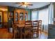 Inviting dining room with wood floors, traditional furniture, and ample natural light at 114 Summer Glen Pl, Dallas, GA 30157