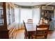 Charming dining area with bay window, wooden table, and decorative coffee bar at 114 Summer Glen Pl, Dallas, GA 30157