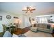 Open-concept living room and dining area, perfect for entertaining guests at 1575 Kilmington Ct, Alpharetta, GA 30009