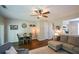 Comfortable living room area featuring modern furniture and seamless access to outdoor space at 1575 Kilmington Ct, Alpharetta, GA 30009