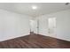 Bedroom with modern flooring, recessed lighting and white walls at 1721 Hortense Nw Pl, Atlanta, GA 30318