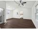 The bonus room includes a modern ceiling fan, recessed lighting, and access to the stairs at 1721 Hortense Nw Pl, Atlanta, GA 30318
