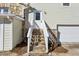 Exterior view showing stone stairs leading to door and garage at 1721 Hortense Nw Pl, Atlanta, GA 30318