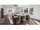 Bright living room featuring neutral decor, modern furnishings and large windows, creating a welcoming space at 1721 Hortense Nw Pl, Atlanta, GA 30318