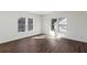 Living room featuring hardwood floors and multiple windows at 1721 Hortense Nw Pl, Atlanta, GA 30318