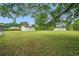 Spacious yard with mature trees, and a storage shed in the backyard at 46 Forkwood Cir, Hiram, GA 30141
