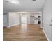 Bright, open-concept living space featuring hardwood floors and connecting to the kitchen at 46 Forkwood Cir, Hiram, GA 30141