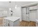 Bright open kitchen with an island, stainless steel appliances, and modern cabinetry at 2590 Eastwood Dr, Decatur, GA 30032