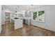 Spacious kitchen with modern appliances, white subway tile, and hardwood floors at 2590 Eastwood Dr, Decatur, GA 30032