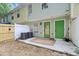 Cozy back patio with green doors, ideal for relaxing outdoors at 2864 Vining Ridge Ter, Decatur, GA 30034