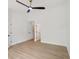 Bright bedroom features neutral walls, hardwood floors, and a ceiling fan at 2864 Vining Ridge Ter, Decatur, GA 30034